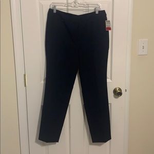 Navy ankle length dress pants.